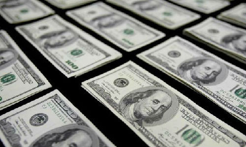 资料图:美元从本质上讲只是美国掠夺世界财富的工具。